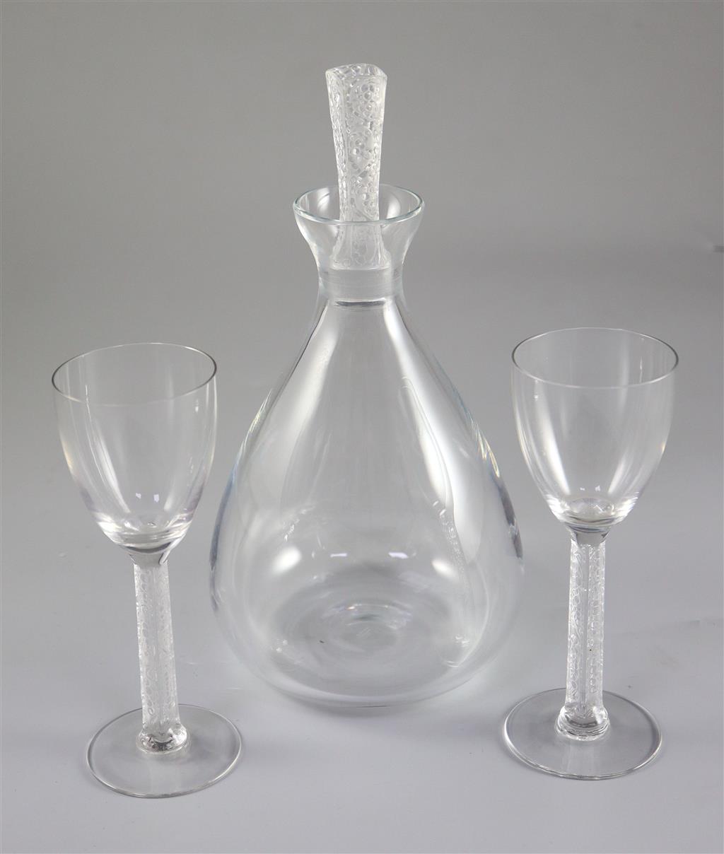 René Lalique. A Phalsbourg pattern glass decanter and two glasses, no.5057/505?, designed in 1924, 24 and 15.5cm high